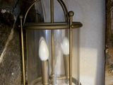a light that is hanging from a wall in a room