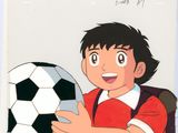 cellule d'animation représentant un garçon tenant un ballon de football