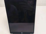 a tablet computer that is sitting on a table