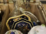 many different types of china on display in a box