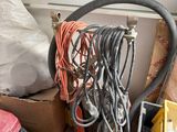 a pile of assorted items in a cluttered room