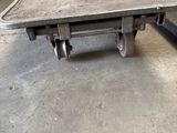 an image of a truck with a flat bed in a garage
