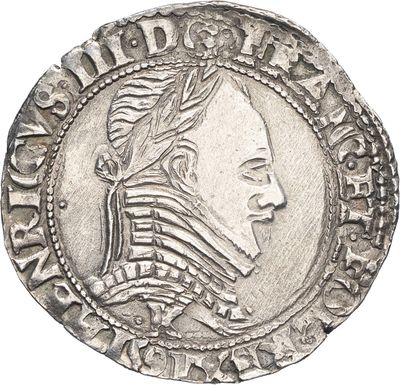 une pièce de monnaie en argent portant l'image d'un visage de femme
