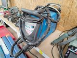 many different types of welding equipment sitting on a shelf