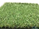 a close up view of a green artificial grass mat