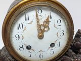 a clock that is sitting on top of a table