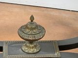 an image of a table with a vase on it