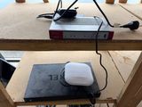 an image of a table with a laptop and a router