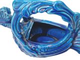 a blue vase with a blue fish inside of it