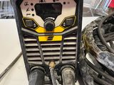 a close up of a welding machine on a table in a store
