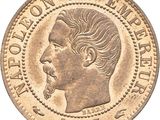 a close up of a coin with a man ' s face on it
