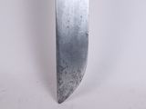 a large knife that is sitting on a white surface