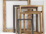several different frames are arranged on a white surface
