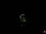 a cell phone that is lit up in the dark