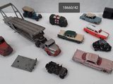 a lot of toy cars that are on a table