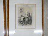 a framed picture of a woman sitting on a bed
