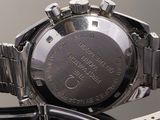 a close up of a watch on a table