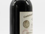 a bottle of wine that is sitting on a table