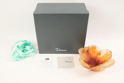 an image of a box with a flower inside of it