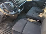 the interior of a car with a steering wheel and a dashboard