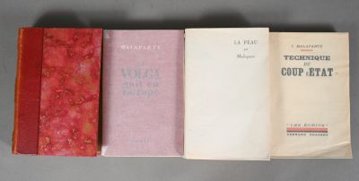 three books sitting on top of a table next to each other