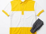 a yellow and white shirt with a black and white scarf