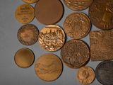a lot of coins that are laying on a table