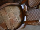 a chair that has a seat made out of wood