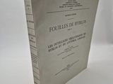 the front cover of a book with a white background and a black and white image