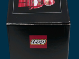 a black box with stickers on it sitting on a blue surface