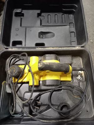 a box with tools in it sitting on the ground