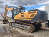 an image of a construction vehicle parked in a lot