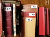 a lot of books that are sitting on a shelf