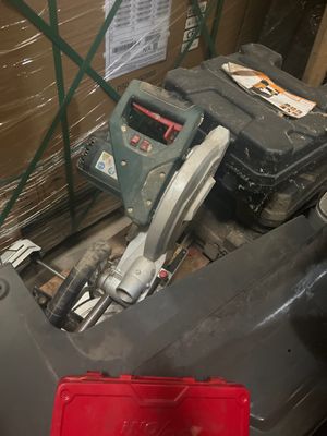 a red box that is sitting on the floor next to a red box