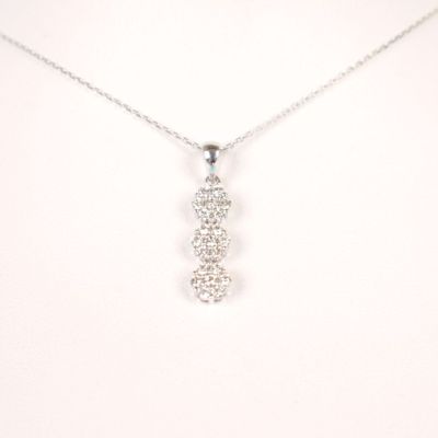 Pendentif Trilogie et sa chaîne maille forçat dimantée en or…