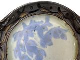 a picture of a picture of a blue and white plate