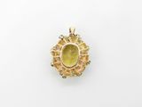 a yellow sapphire and diamond pendant