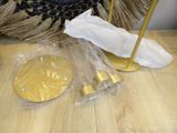a broom and a bag on a table next to a broom