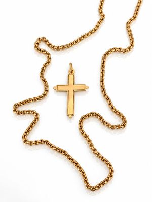 a gold cross pendant with a chain on a white background