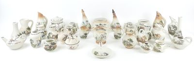 a lot of silver objects that are on a white surface