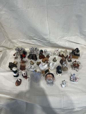 a white sheet that has a bunch of figurines on it
