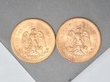 two gold coins sitting on top of each other