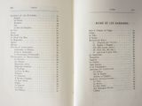 a book open to a list of items that are on the table