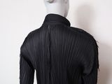 an image of a mannequin wearing a black dress