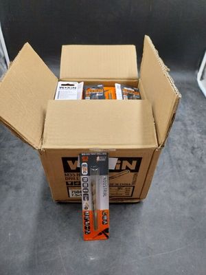 a cardboard box with a bunch of items inside of it