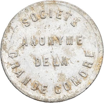 a close up of an old coin with writing on it