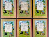 four children ' s books with pictures of people and animals on them