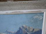 a picture of a painting hanging on the wall