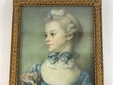 portrait of a woman with a cat in a blue dress