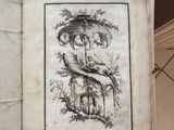 un livre ouvert sur lequel est dessiné un serpent